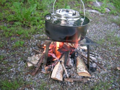 Stainless steel coffee pot, forest boiler, fire, wilderness